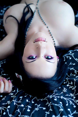 Harlequin in 'Busty Emo Girl Rolling in Bed' via Suicide Girls